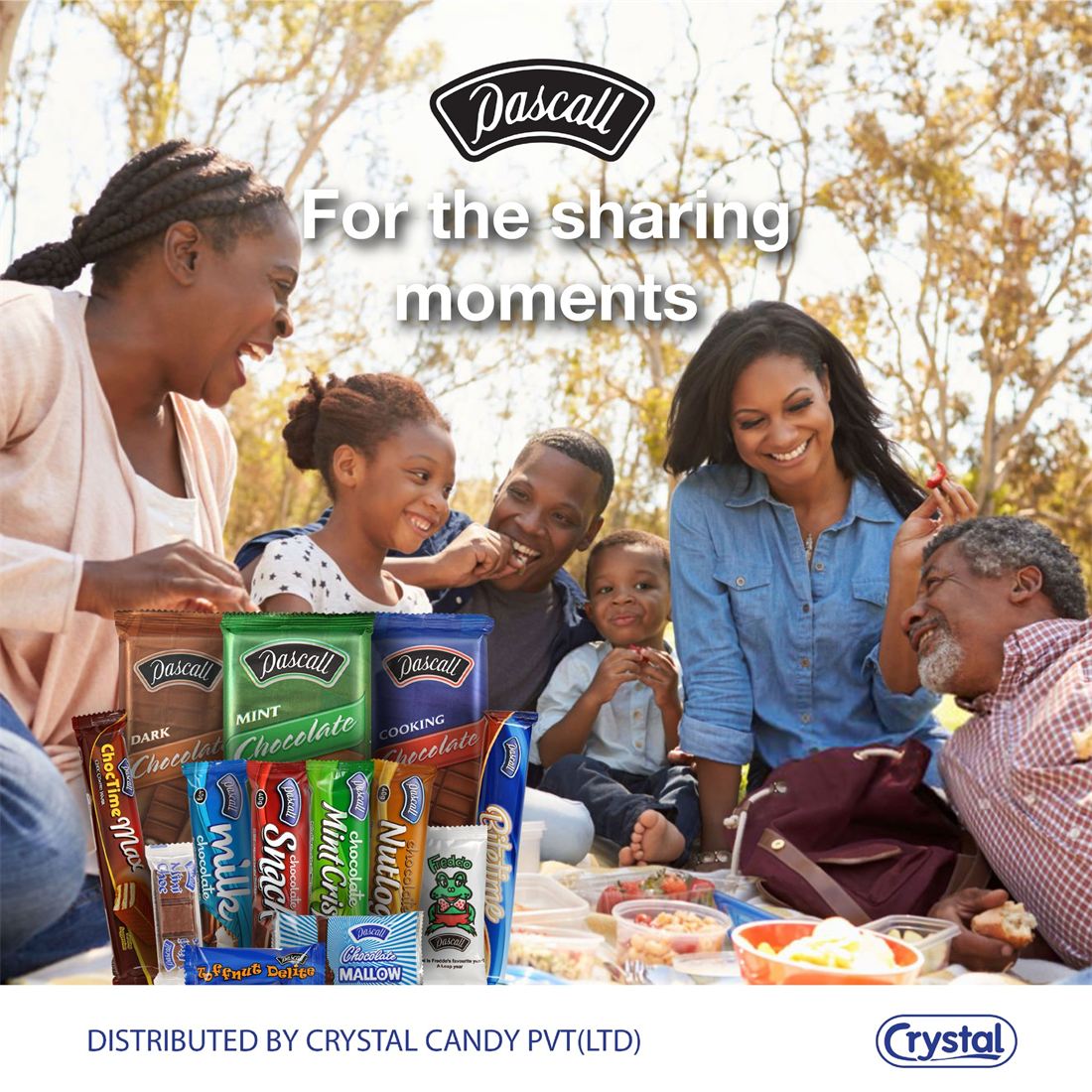 A family sharing Pascall chocolate at a picnic